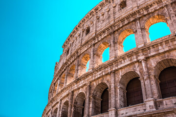 Obraz premium Amphitheater Colosseum, Italy Travel around Rome, wonder of the world, excursion and interesting tourist excursion to the ancient city, History of Ancient Rome monument
