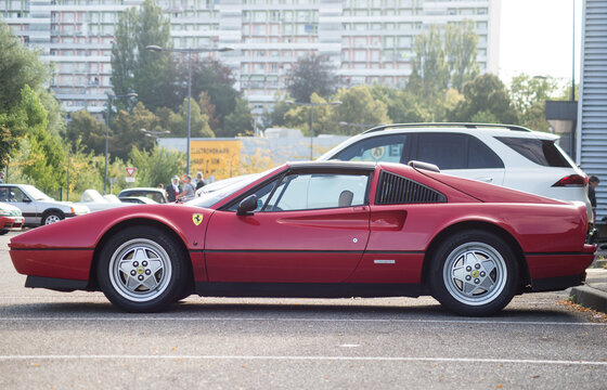 Mulhouse - France - 12 September 2021 - Profile view of red Ferrari 308 GTS parked in the street