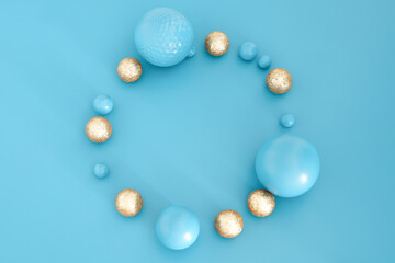 Blue Christmas composition with gold details. Trendy Xmas background, mockup. Modern design. Free space for text, copy space. Flat lay, top view.