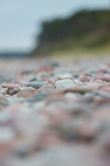 Beautiful baltic beach shoreside landscape view with rocks cloudy overcast weather.