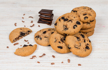 Chocolate chip cookies on a wooden table.