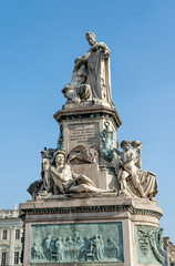 Fototapeta na wymiar Statue of Camillo Benso, Count of Cavour, built in 1873 by Giovanni Duprè, made of Carrara marble, in Carlo Emanuele II square, Turin city center, Piedmont region, Italy