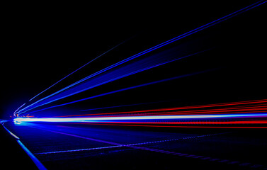 blue lights of cars with night. long exposure