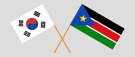 Crossed flags of South Korea and South Sudan. Official colors. Correct proportion