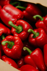 Close up of fresh red peppers in a market
