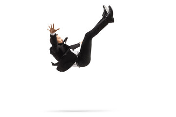 Man in a suit falling down