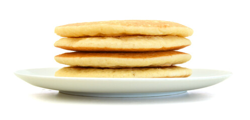 A stack of plain pancakes in plate on a white background.