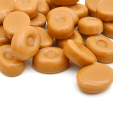 caramel candies over white