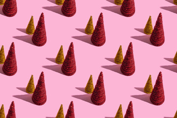 Colored Christmas trees on a pink background. Christmas concept, seamless pattern