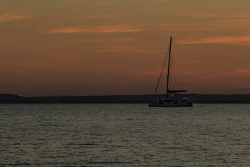 Fototapeta premium Vessel on the bay of Santa Pola at sunset
