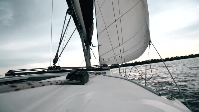 Sailing on a yacht at sunset.