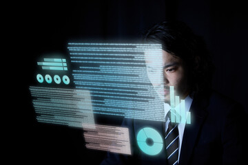 宙に浮いたデータを眺めるビジネスマン