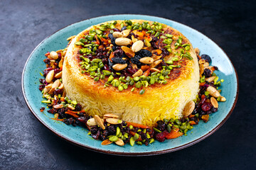 Traditional Persian tahdig jeweled javaher polow bride basmati rice with dried fruits and berries...