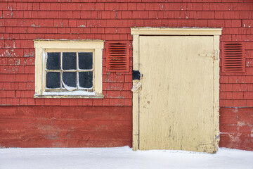 Old red shingled barn in rural America.