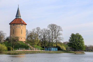 Obraz premium Slottsparken park pond and old tower panorama, Malmo, Sweden