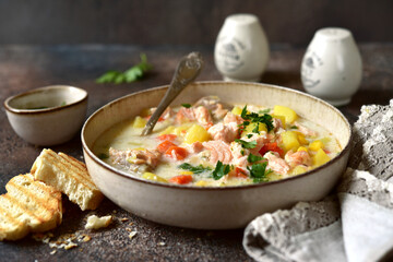 Chowder - thick potato soup with trout ( salmon ) and cream .