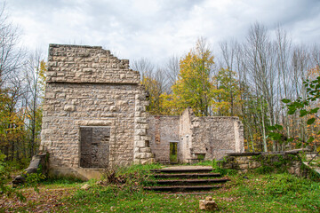 Fototapeta na wymiar The ruins of an old mansion known as The Corran lie in the forest at Spirit Rock Conservation Area near Wiarton, Ontario.