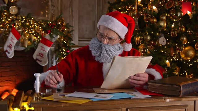 A scene of Christmas magic, where Santa Claus writes letters to children and fulfills their cherished wishes and dreams