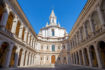 Fototapeta na wymiar Rome - The facade and atriuum of baroque church Chiesa di Sant'Ivo alla Sapienza designed by Francesco Borromini (1642 -1660).