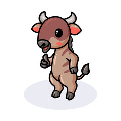 Cute little wildebeest cartoon giving thumb up