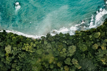 Muurstickers Top view shot of a beautiful island in Costa Rica, USA © Charlie Orellana/Wirestock