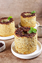Mini banana chiffon cake with chocolate sauce.