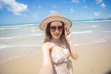 Woman Enjoying on the Beach. Beach vacation. happy young woman in the sea beach