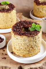 Mini banana chiffon cake with chocolate sauce.