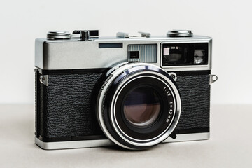 Close-up vintage film camera on white background ,old rangefinder camera
