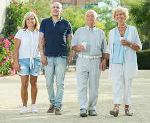 Portrait of smiling pensioner walking outdoor