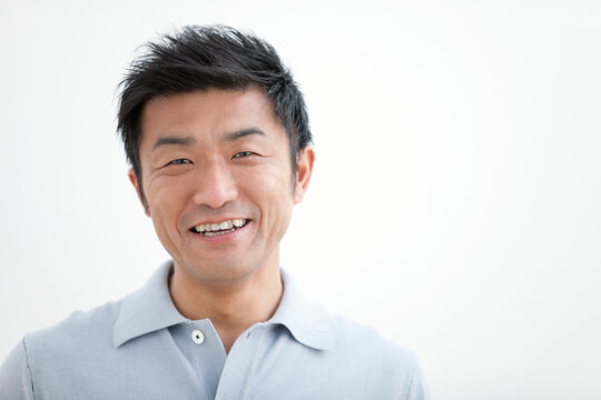 笑顔の中年男性