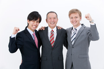 ガッツポーズをするビジネスマン3人