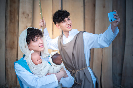 Nativity Scene Where Two Androgynous People Taking Selfie With Mobile