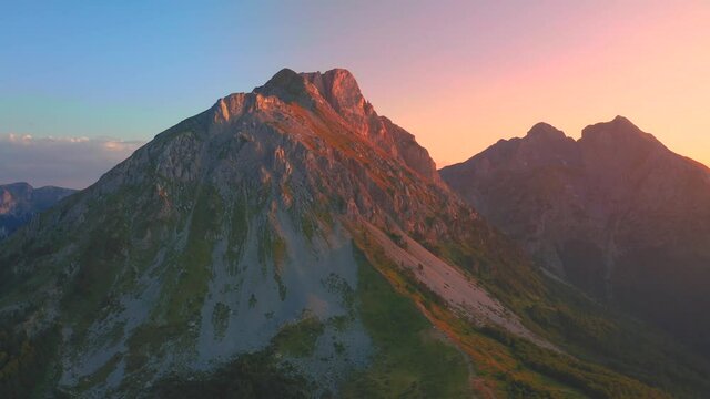 Sunset on Komovi Mountains in Montenegro, summertime contryside. Aerial drone view.