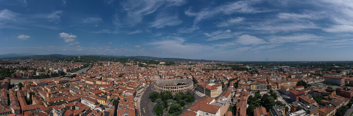 Naklejka na ściany i meble Aerial panorama of Piazza Bra in Verona. Verona, Italy aerial view of the historic city. Monument to Unesco Arena di Verona top view. Famous amphitheater in Italy aerial view.