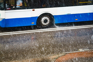 Rainy road with city bus