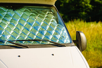 Camper with internal thermal screen blind at window