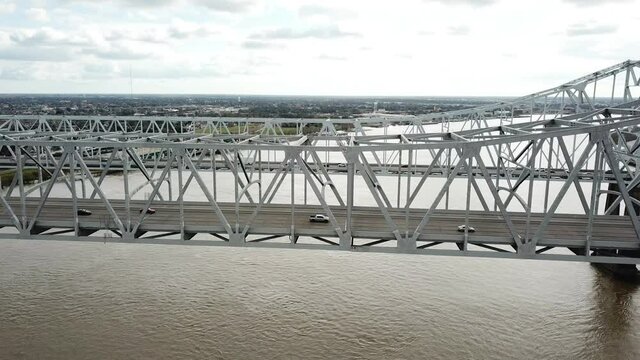 Vehicles Driving At The Crescent City Connection On A Cloudy Day In Louisiana, USA. aerial