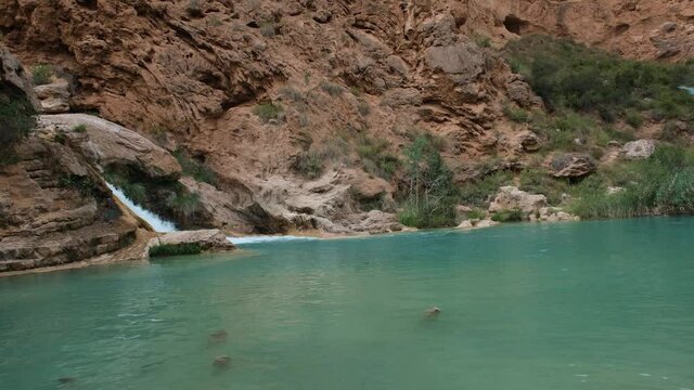 Pan Down shot at the river source in Chorreras del Cabriel in Cuenca, Spain