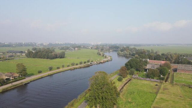 Aerial view of Amstelveen Oudekerk ad Amstel typical dutch landscape and historic village along the Amstel river in The Netherlands.