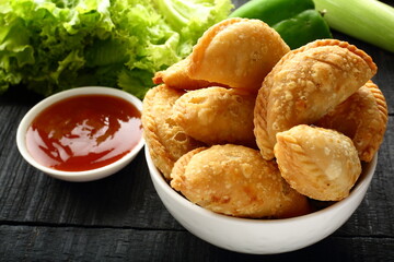 Crispy baked fresh curry puffs, samosa.