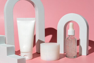 Beauty cosmetic skincare on pink background. Trendy presentation with podiums and hard shadows. Mockup for your design