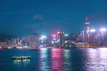 Obraz premium Colorful night view of the famous tourist location, Victoria Harbour, Hong Kong