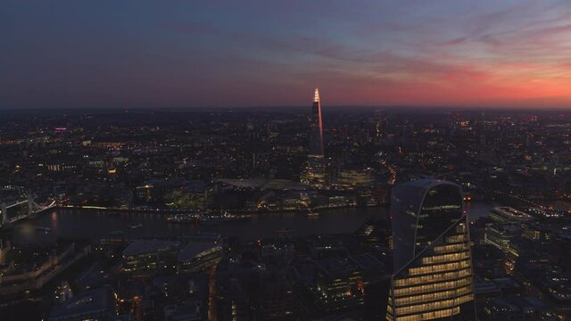 Aerial Dusk view of London with views from Tower Bridge to the Gherkin.