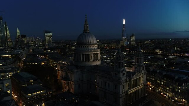 Aerial view at dusk of St Pauls Cathedral showing the Shard in the background