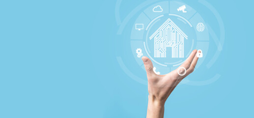 Hand hold house icon.Smart home controlled, intelligent house, and home automation app concept.Pcb...