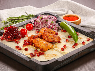 Chicken hip barbecue served onion
