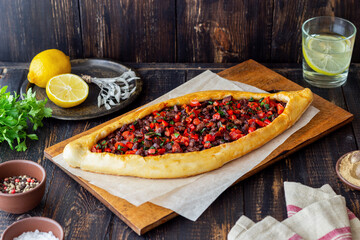 Traditional Turkish pide with meat. Turkish cuisine. National food.