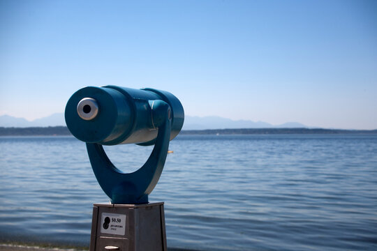 coin operated binoculars on the beach - Powered by Adobe