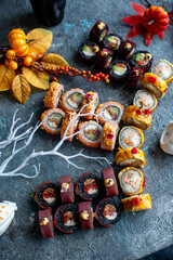 Obraz na płótnie Canvas Halloween sushi rolls on the table